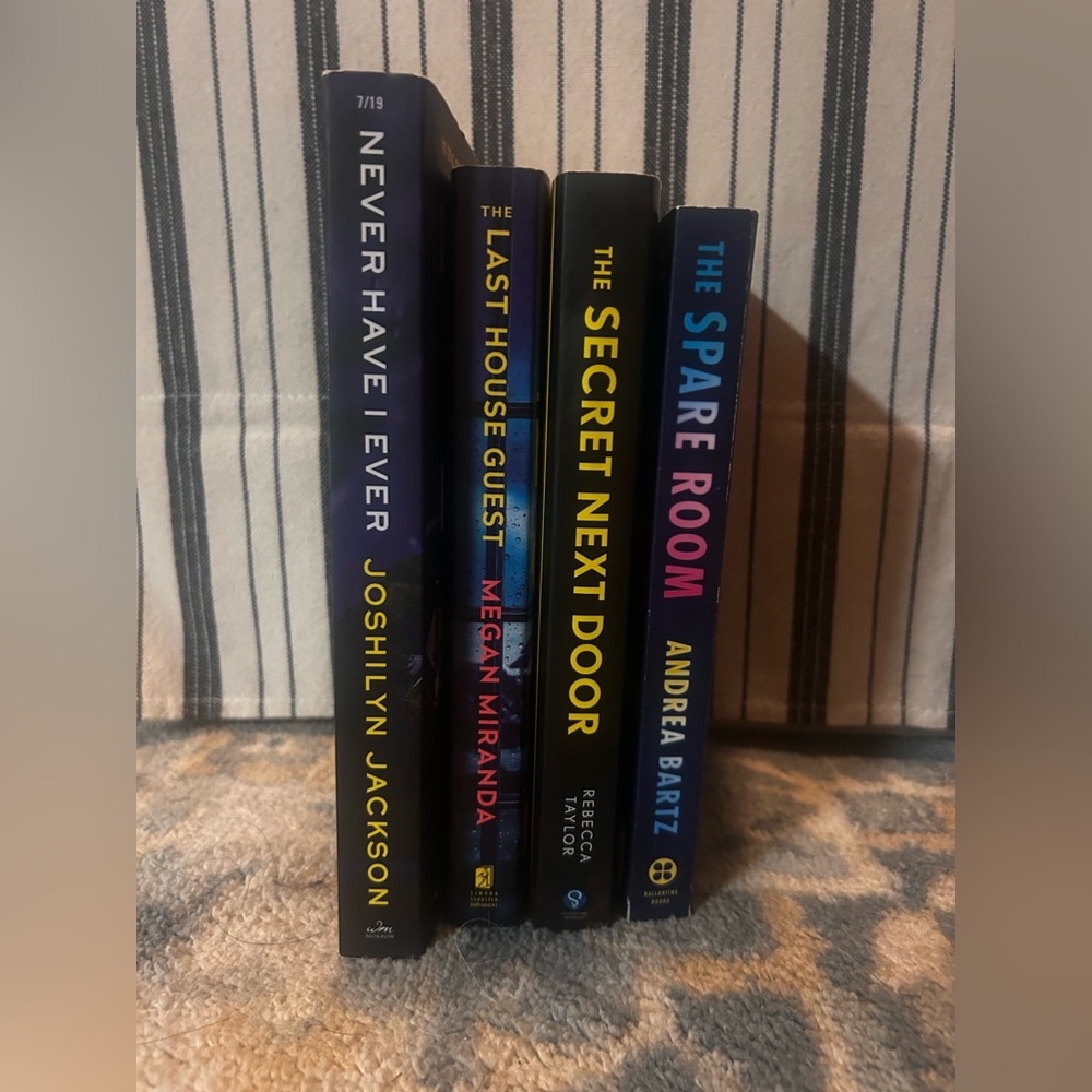 Set of 4 paper back books